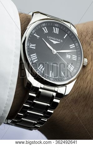 Saint-imier, Switzerland 31.03.2020 - Closeup Fashion Image Of Longines Watch On Wrist Of Man Longin