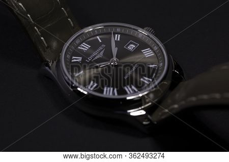 Saint-imier, Switzerland 31.03.2020 - Closeup Image Of Longines Watch Lying On A Black Leather Backg