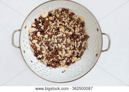 Variety of Soaked Dried Beans & Lentils in Colander