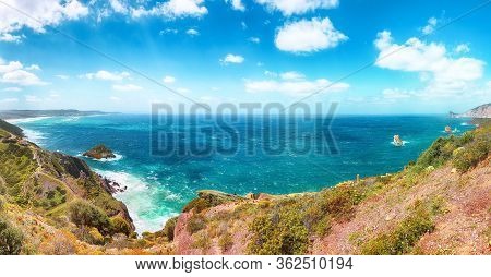 Astonishing Spring View Of Nebida And Fontanamare Coastline With Scoglio Il Morto And Turquoise Sea.