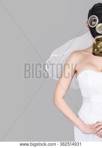 Cyberpunk Bride In Veil Dress And Protective Gas Mask And Veil Posing.