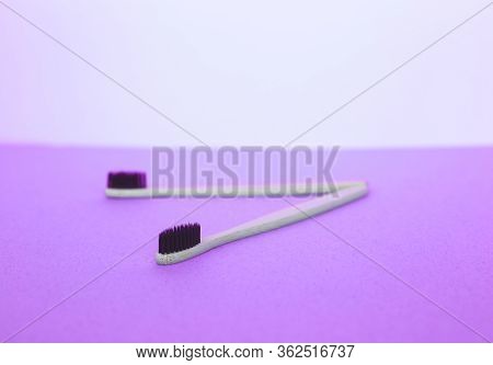 Zero Waste Concept. Bamboo Toothbrushes On A White-blue Background