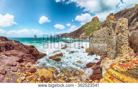 Fantastic Spring View Of Ancient Ruins Of Laveria Lamarmora (miniera Di Nebida) And Nebida Coast. St