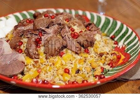 Pilaff rice in clay plate, close-up