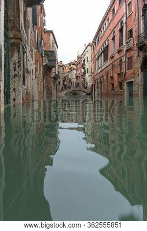 Venice, Italy - 1 November 2018: acqua alta, view on a street has been flooded by waters rising 156 cm