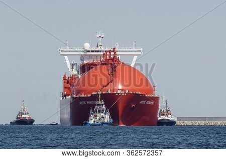 Swinoujscie, West Pomeranian / Poland - 2019: The Beautiful Red Lng Arctic Princess Tanker Flows To 