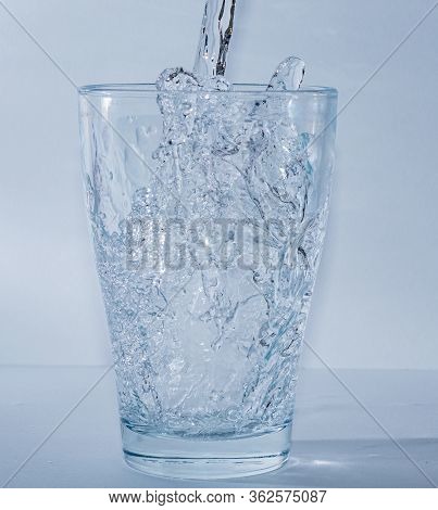 Filling Water In Glass - Mineral Water In Clear Waterglass