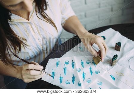 Girl Master Makes Stamps On The Fabric. Handmade