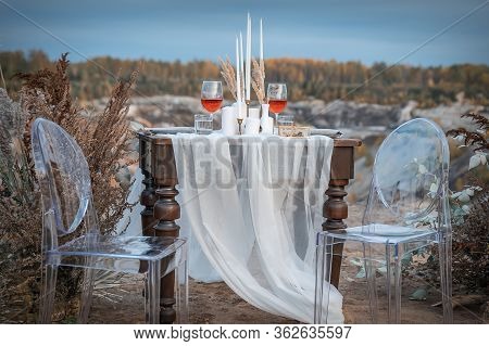 Wedding Decorations. The Venue For The Outdoor Wedding Ceremony Is Decorated With A Composition Of D