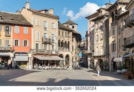 View Of The Market Square Or Piazza Del Mercato With Medieval Buildings, Domodossola, Italy