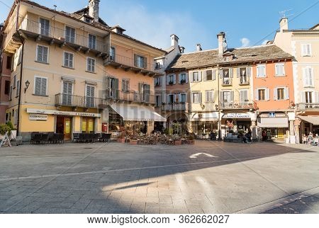 View Of The Market Square Or Piazza Del Mercato With Medieval Buildings, Domodossola, Italy