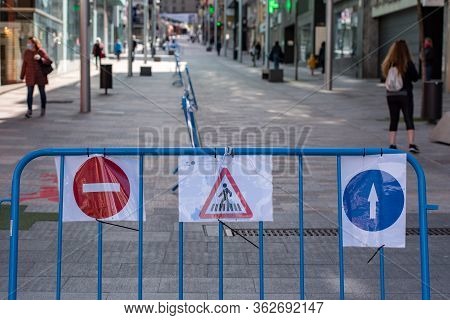 Escaldes Engordany, Andorra : 23 April 2020 : People In The Street Whit Symbols On The Covid-19 In E