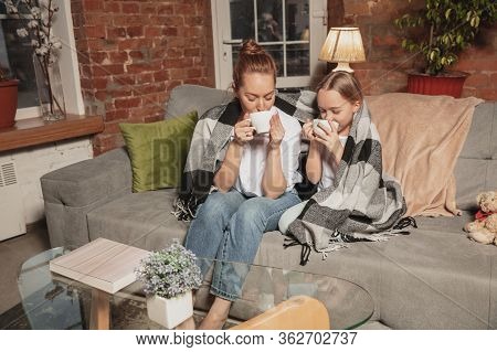 Tea Drinking, Talking. Mother And Daughter During Self-insulation At Home While Quarantined, Family 