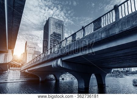 Bridge And Tall Buildings In The Southern New City, Ningbo, China.
