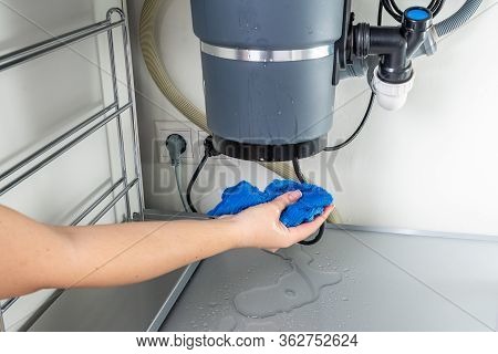 Waste Disposal Leak Under A Sink, Broken Garbage Chopper