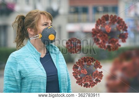Woman wearing a real anti-pollution and anti-viruses face mask outside. SARS COVID-19 pandemic concept