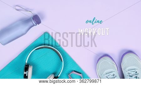 Fitness Equipment And Workout Accessories With Clothes Flat Lay. Online Workouts At Home During Quar