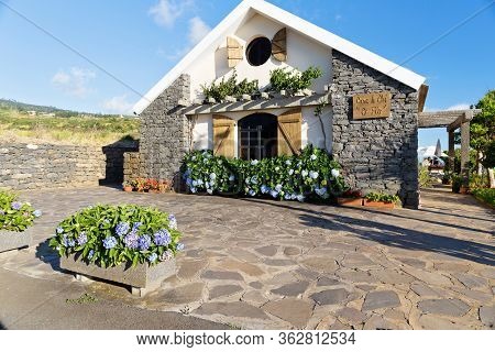 Madeira, Portugal - July 27, 2018: The Cafe Building In The West Of The Island Next To The Lighthous