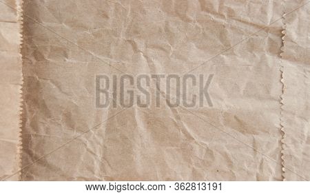 Brown Reusable Paper Bag Texture. Ecological Background Texture. Crumpled Craft Paper.