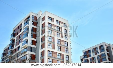 Modern Condo Building With Big Windows And Modern Facade.