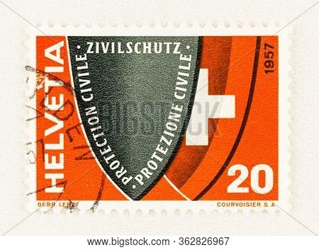 Seattle Washington - April 18, 2020: 1957  Swiss Postage Stamp Publicizing Swiss Civil Defense, Feat