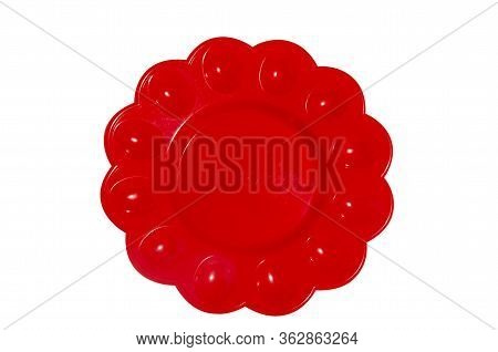Red Plastic Plate For Easter Eggs On White Background. Isolated Object.