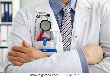 Male Medicine Therapeutist Doctor Chest With Stethoscope In Pocket Closeup. Medical Tools And Instru