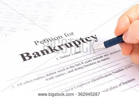 Hand Filling Bancruptcy Petition By Pen. Business Crash.