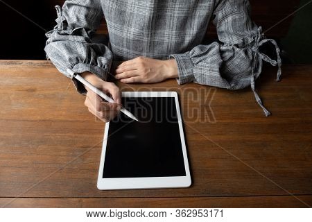 Picture Of Business Woman Working At Home With Her Tablat.