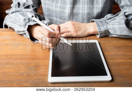 Picture Of Business Woman Working At Home With Her Tablat.