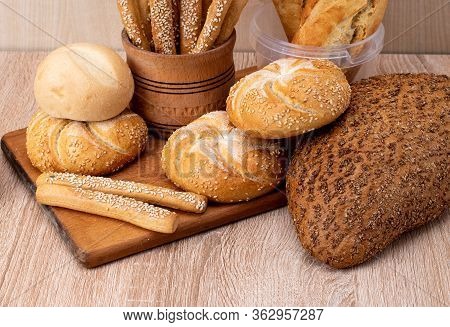 Сrisp Bread With Buns. French Baguettes. Fresh Crispbread. Bread Background. Different Breed  On Woo