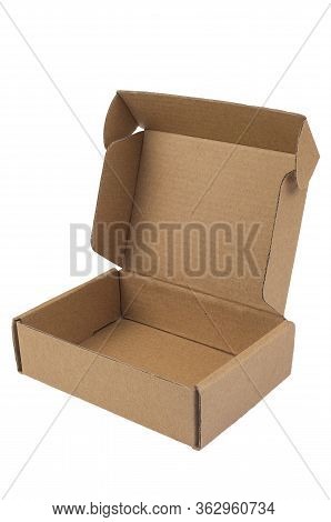 A Small Brown Cardboard Box Is Standing Open. Delivery, Packaging Concept