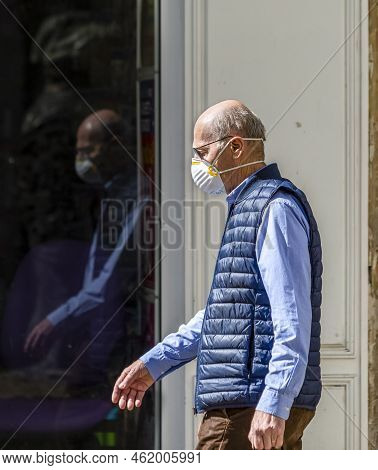 Chartres, France - Avril 18, 2020: Environmental Portrait Of An Unidentified Man With A Protective M