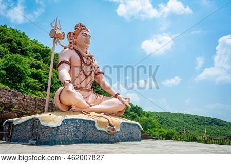 Hindu God Shiva Sculpture Sitting In Meditation. Yoga And Meditation Concept.