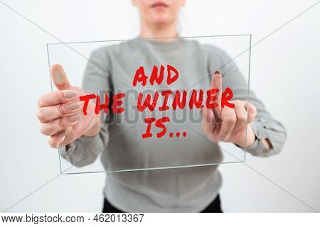 Text Sign Showing And The Winner Is.... Business Overview Announcing Who The Victor Is Exemplar Achi