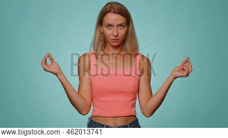 Keep Calm Down, Relax, Inner Balance. Woman Breathes Deeply With Mudra Gesture, Eyes Closed, Meditat