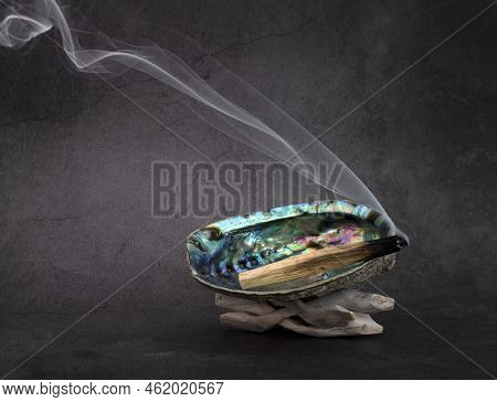 Palo Santo Burning In Front Of White Background