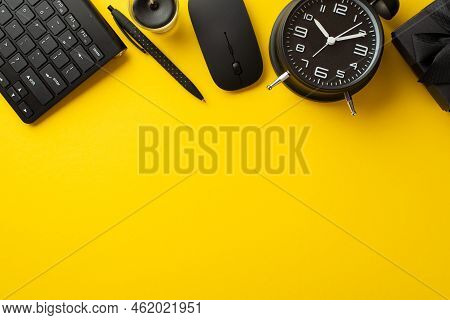 Black Friday Sale Concept. Top View Photo Of Black Giftbox Alarm Clock Pen Candle Computer Mouse And