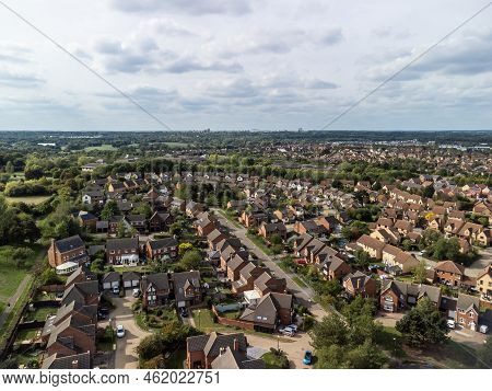Aerial shot looking down on urban housing development - housing estate of mainly bungalows in Milton