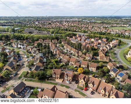 Aerial shot looking down on urban housing development - housing estate of mainly bungalows in Milton
