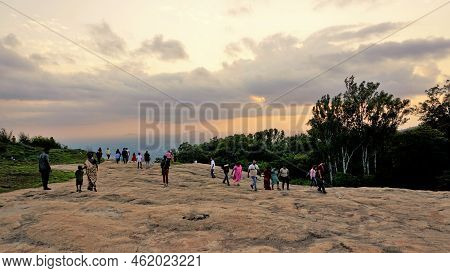 Nandi Hills, Karnataka,india-may 22 2022: Tourists Enjoying The Beautiful Scenic Sunset From Top Of