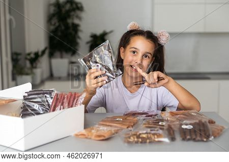 Little Girl With A Box Of Pastilles