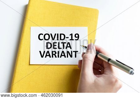 A Text Covid-19 Delta Variant With Various Protection Masks On Background. Covid-19 Delta Variant St