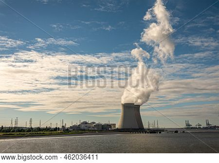 Antwerpen, Flanders, Belgium - July 10, 2022: Sunset On Cooling Towers And Doel Nuclear Power Plant 
