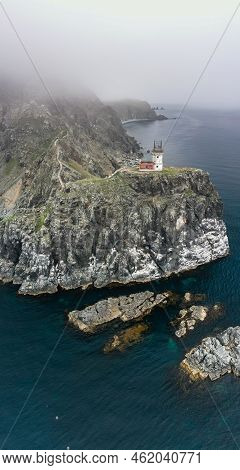 An Old Ruined Lighthouse On Askold Island In The East Sea. A Beautiful Ruined Staircase Leading To T