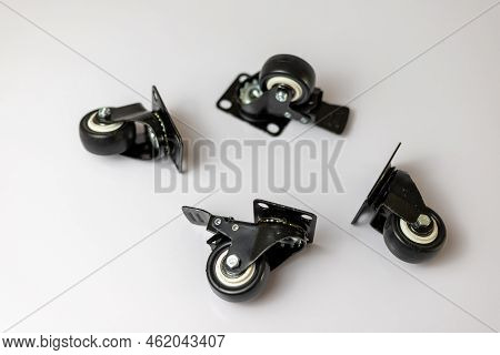 Wheels For Furniture And Heavy Equipment On A White Isolated Background With Selective Focus