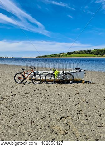 Concept Of Enjoying The Outdoors By Bicycle And Boat At Gweebarra Bay , County Donegal - Ireland