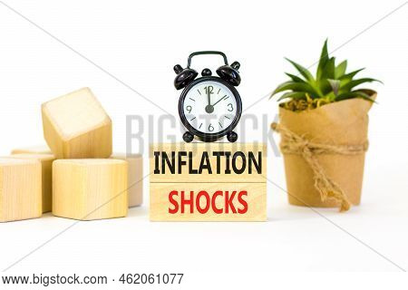 Inflation Shocks Symbol. Concept Words Inflation Shocks On Wooden Blocks. Beautiful White Table Whit