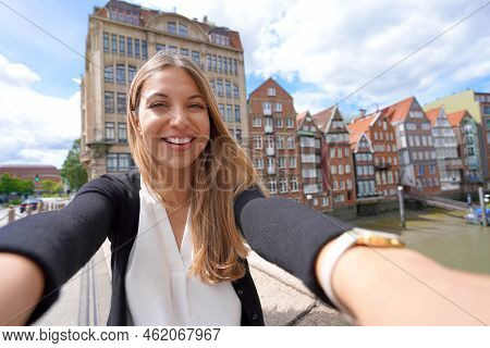 Beautiful Young Woman Taking Selfie Photo With Smartphone In Hamburg, Germany