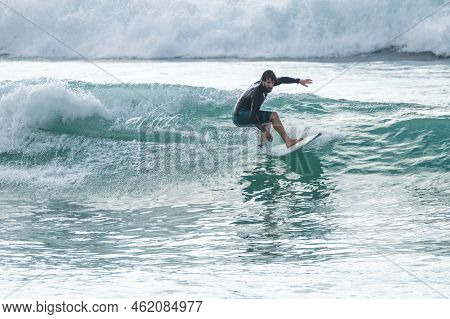 Local Surfer Riding Waves